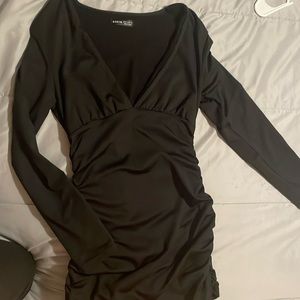 Long sleeve deep v cut black dress size medium knee length dress